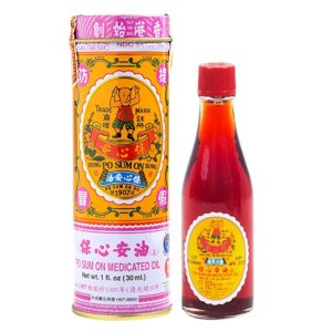 Bottle of oil, net weight 1 fluid ounce, or 30 milliliters. Text is written in chinese and english.