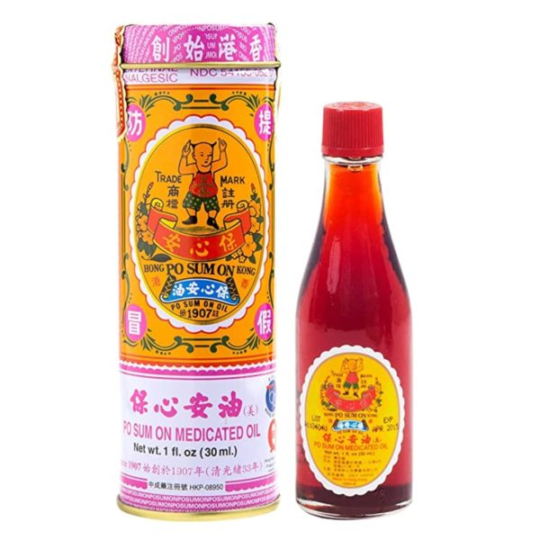 Bottle of oil, net weight 1 fluid ounce, or 30 milliliters. Text is written in chinese and english.